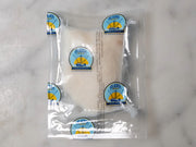 halibut filet vacuum sealed in proprietor's plastic packaging with logos visible