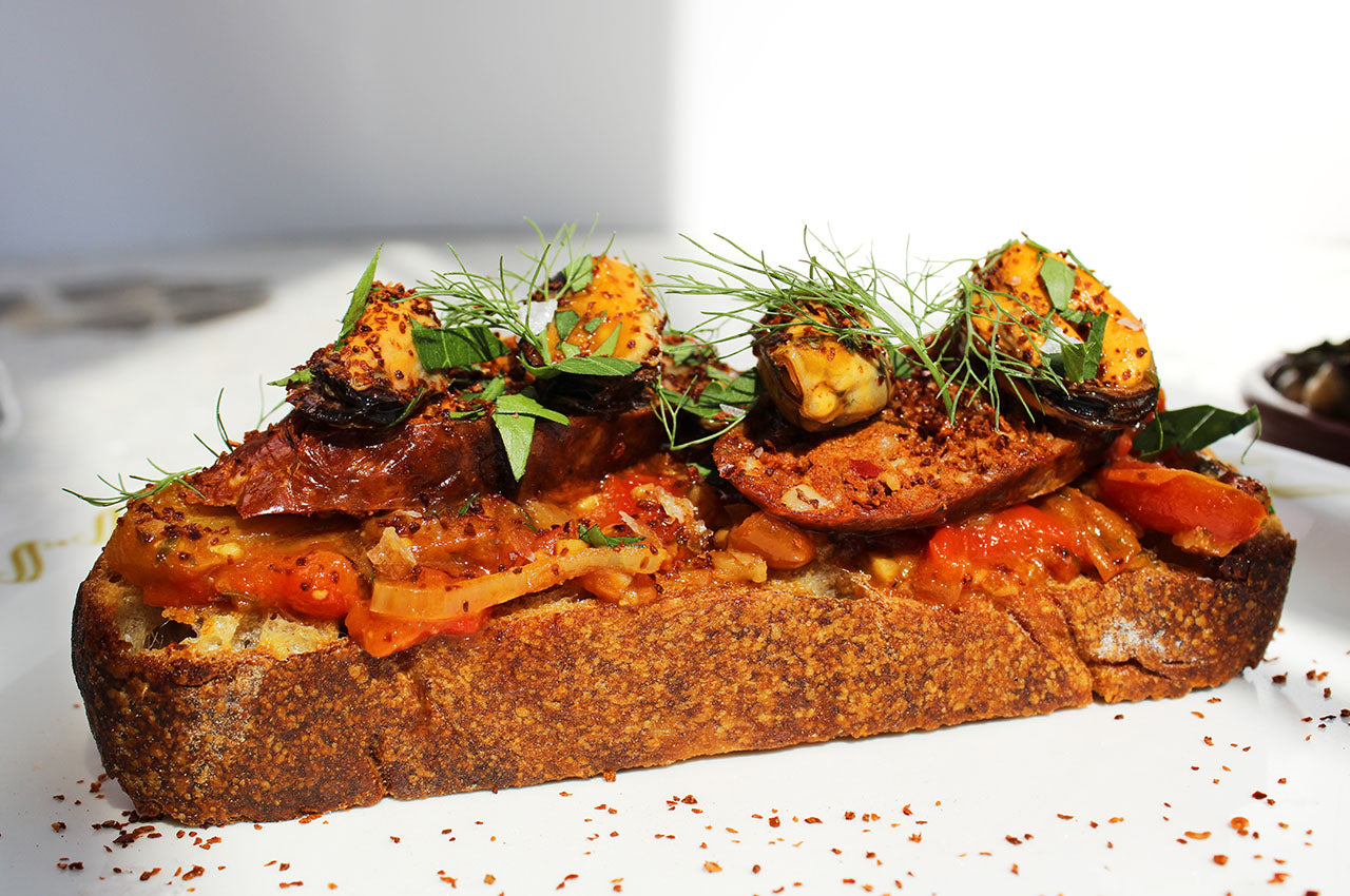 Marinated Mussels on Tomato Chorizo Toast